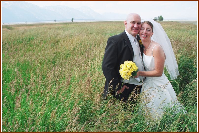 Newlyweds in the tall grass
